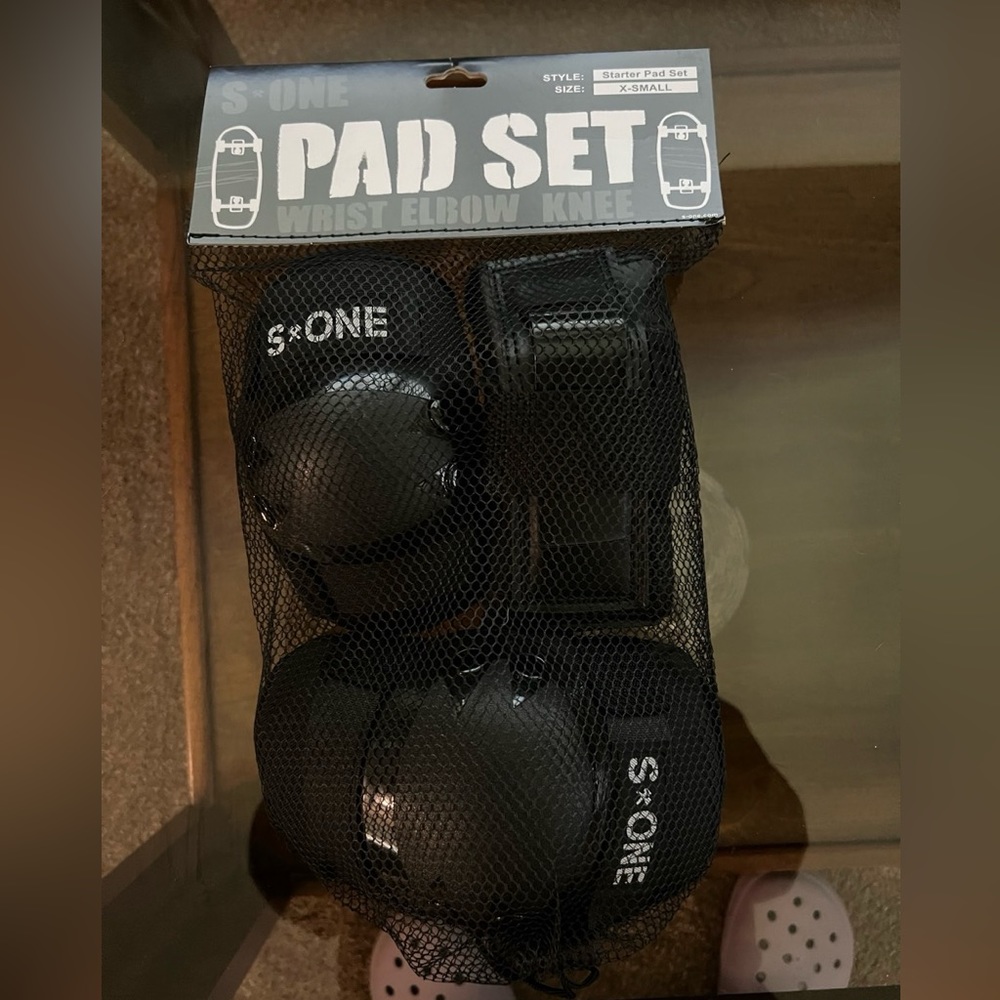 Youth skating pads, new in the bag. (Wrist, elbow and knee pads).